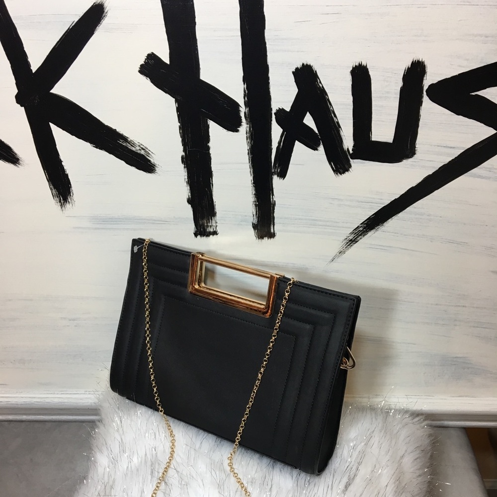 The Classy Black Convertible Clutch